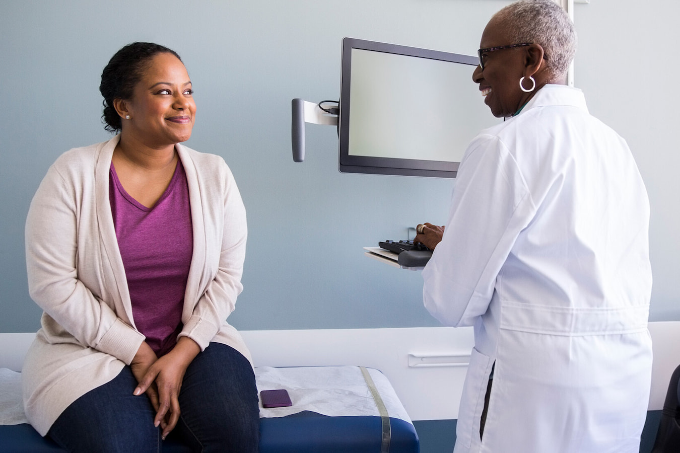 Doctor talking with a patient